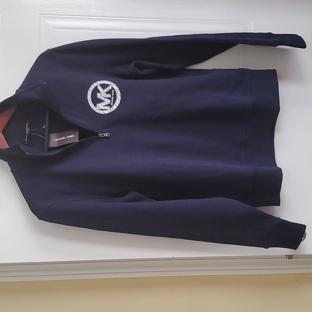 Michael Kors. New never used perfect condition size M
